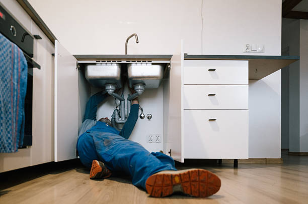 Professional Drain Cleaning technician working in Far Rockaway, NY
